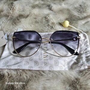 Sunglasses by Armani Exchange